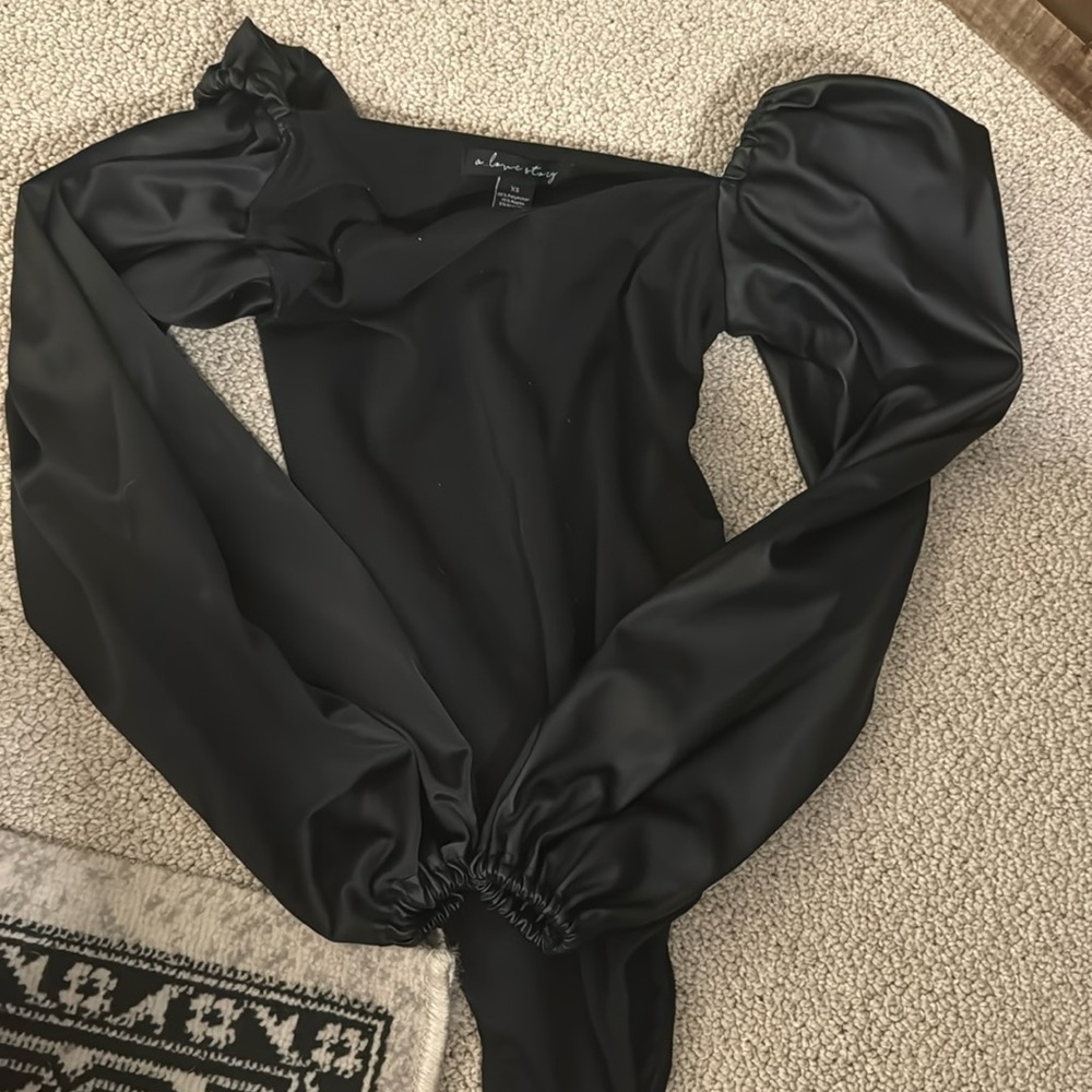 Black leather body suit: versona